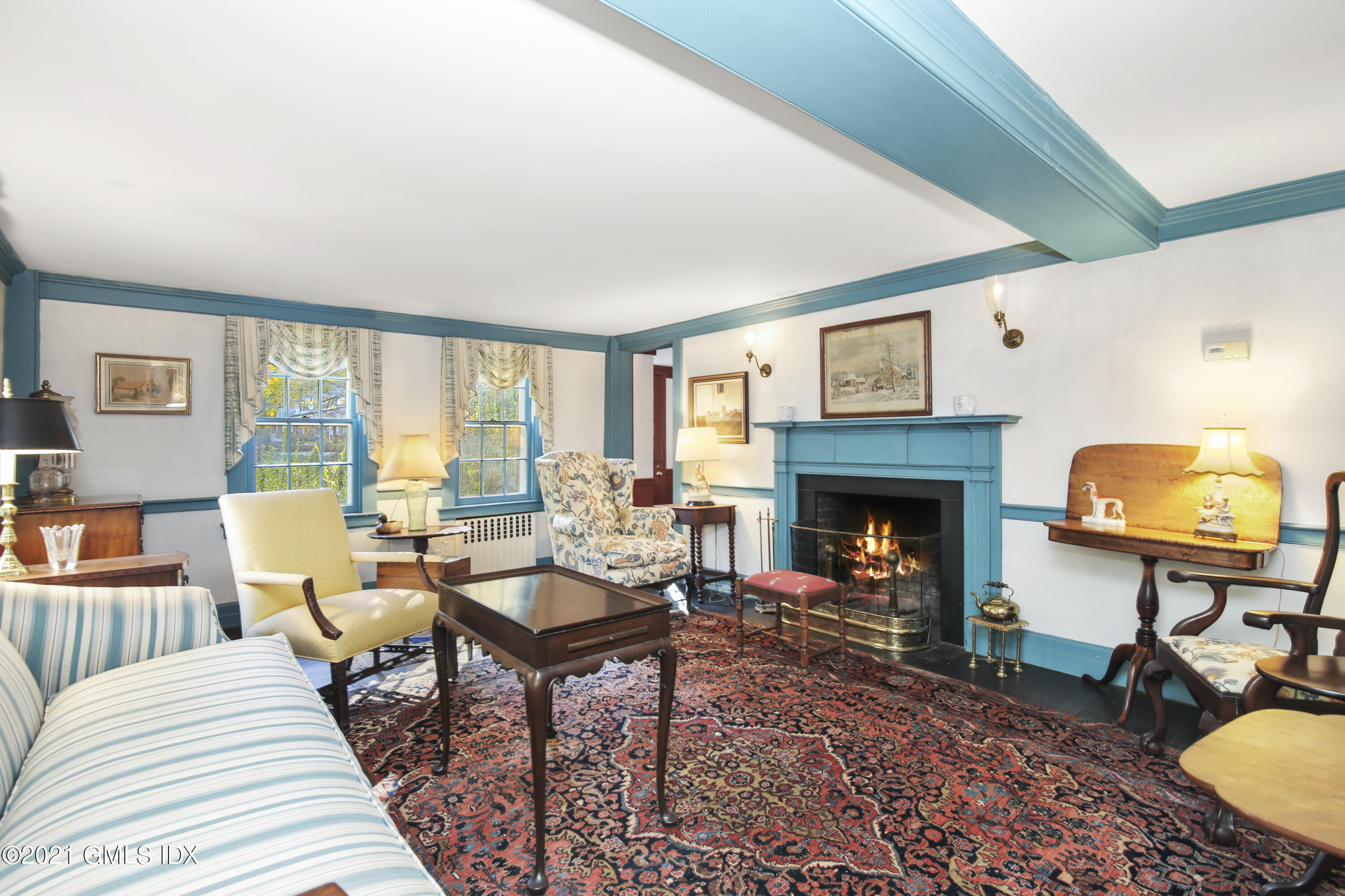 117 Dingletown Road Greenwich, CT 06830 - Photo 6 of 25 a living room with furniture and a fireplace