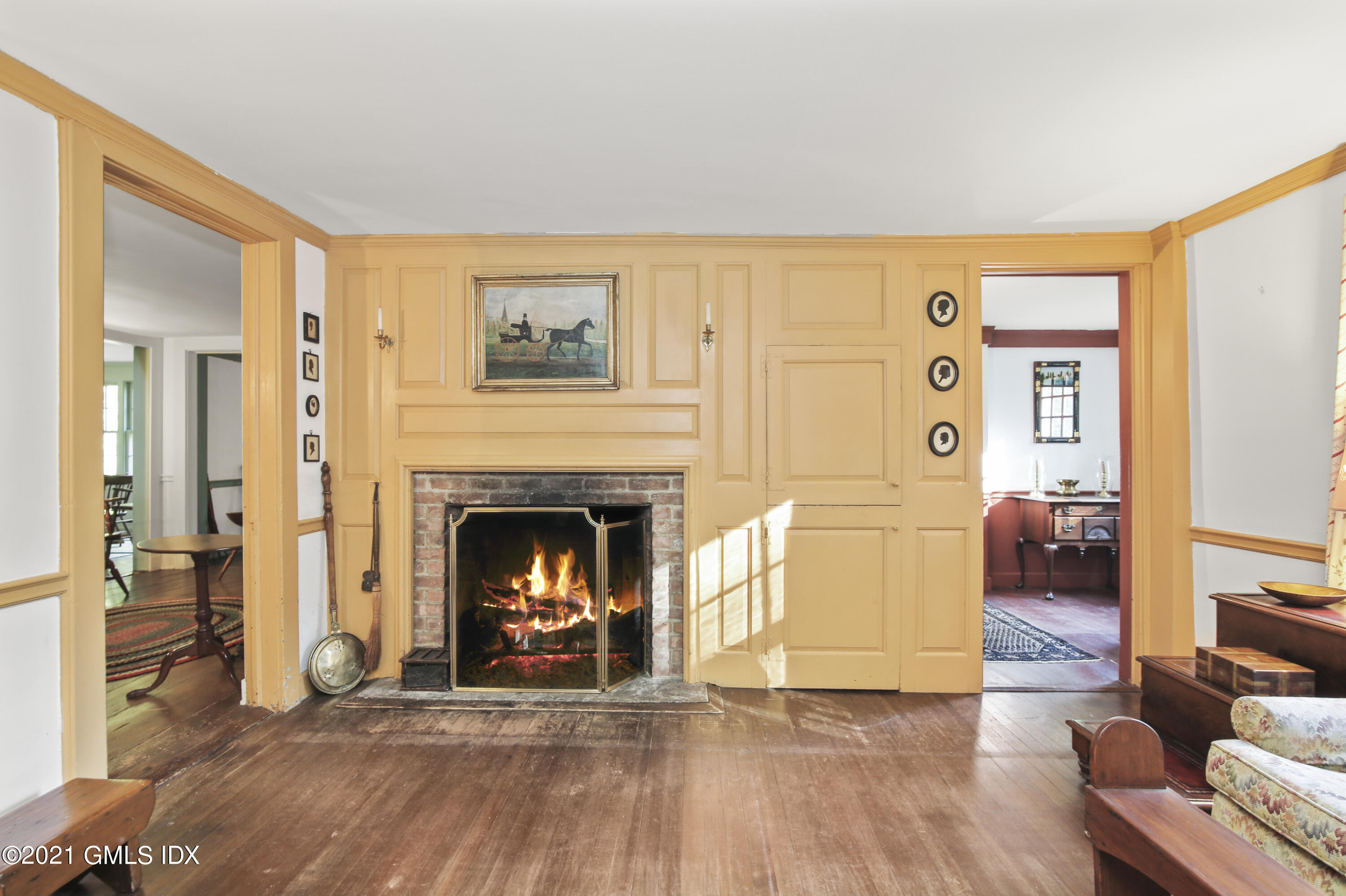 117 Dingletown Road Greenwich, CT 06830 - Photo 7 of 25 a living room with furniture and a fireplace