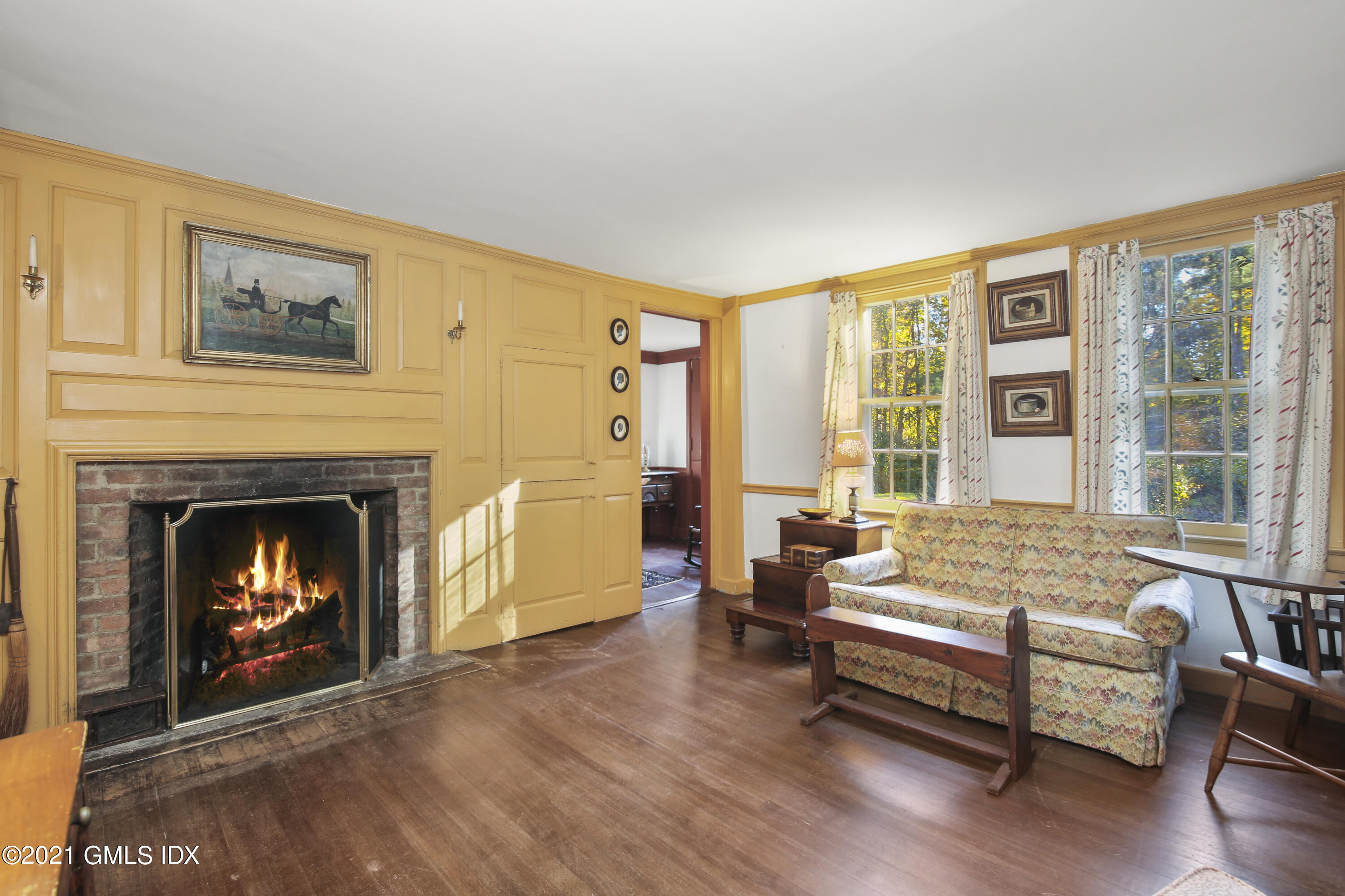 117 Dingletown Road Greenwich, CT 06830 - Photo 8 of 25 a living room with furniture and a fireplace