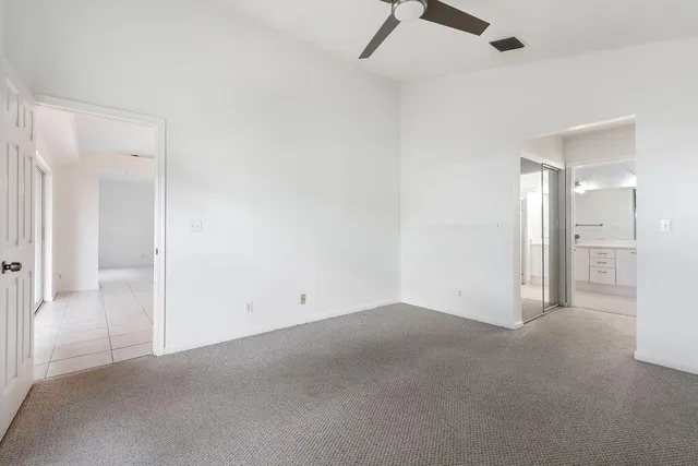 an empty room with a bathroom