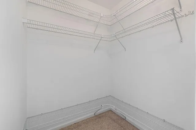 a view of a room with racks on the wall