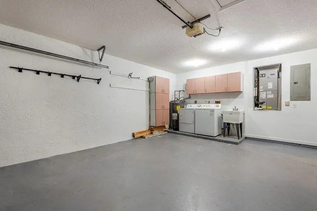 a view of a storage & utility room with two racks