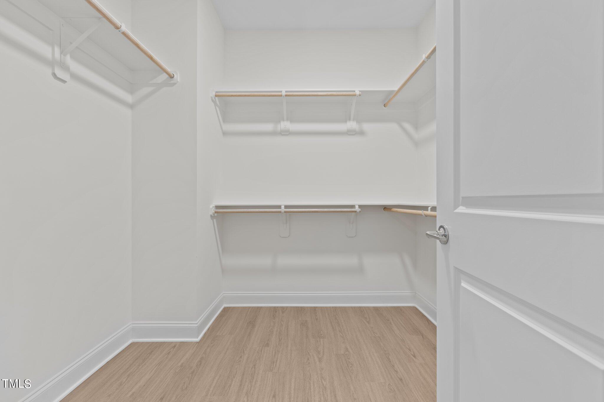 603 Marshskip Way Rolesville, NC 27571 - Photo 18 of 30 a view of an empty walk in closet