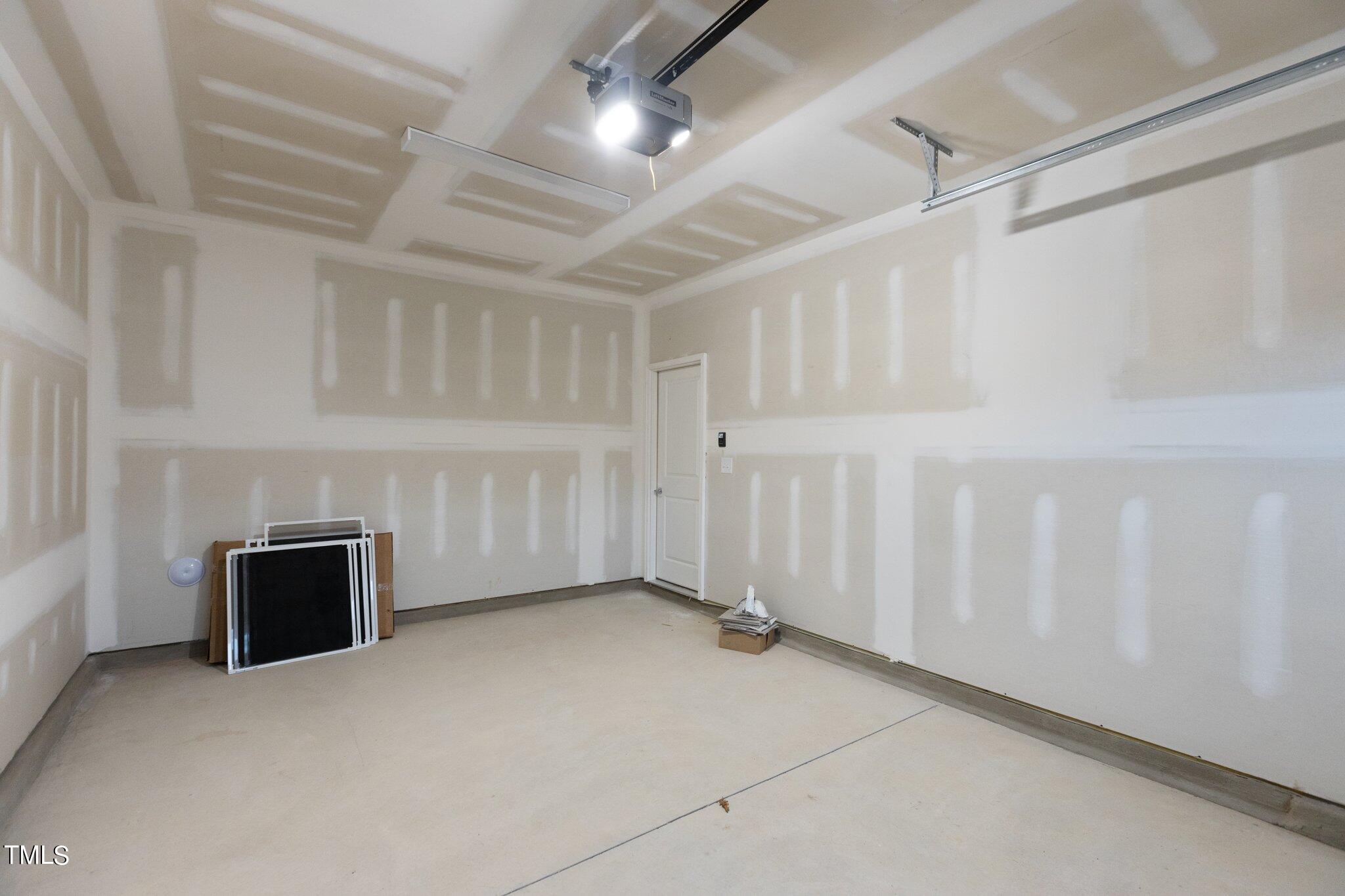 603 Marshskip Way Rolesville, NC 27571 - Photo 26 of 30 a view of an empty room with a fireplace