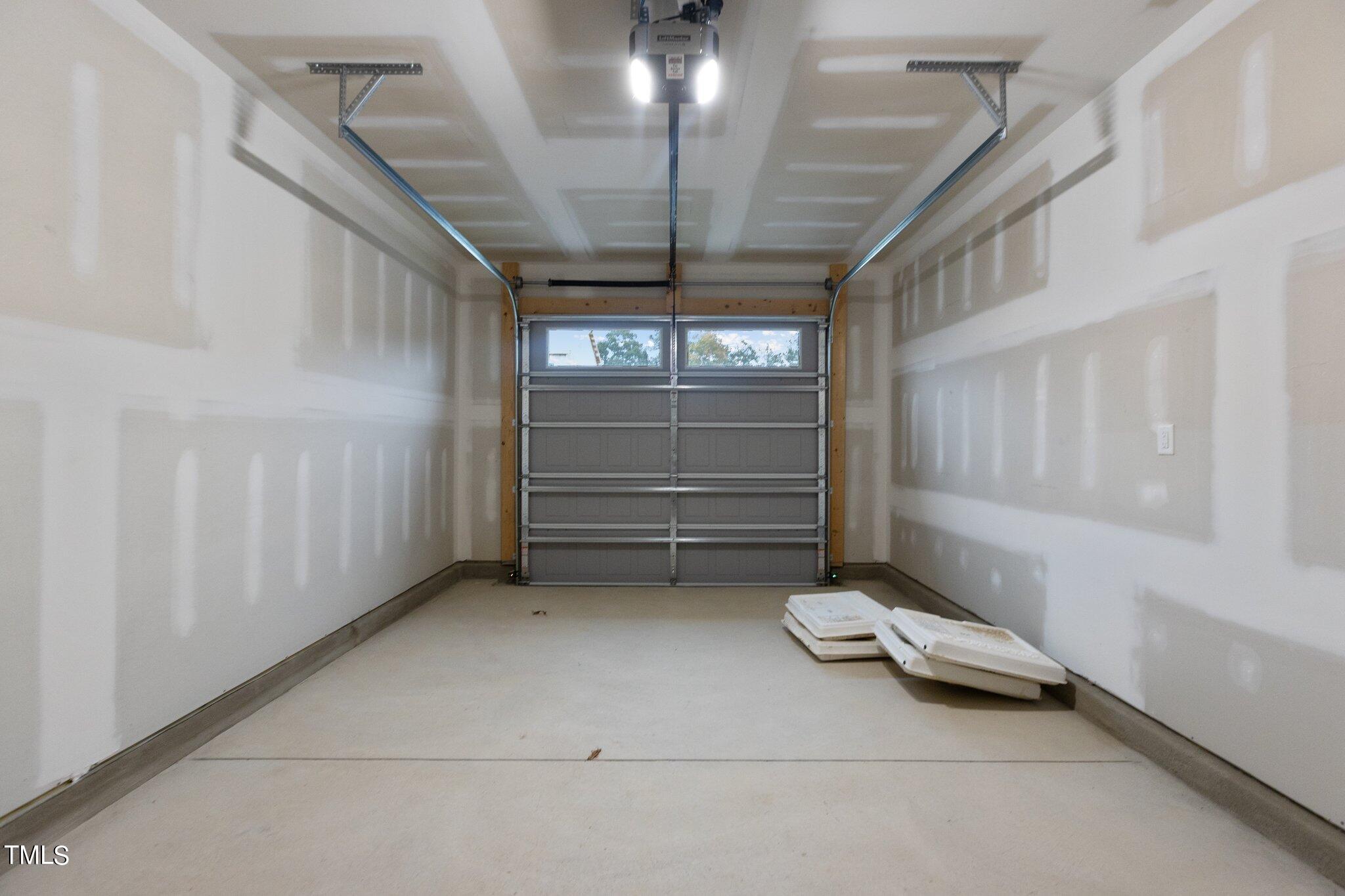 603 Marshskip Way Rolesville, NC 27571 - Photo 27 of 30 a view of room with stairs and a window