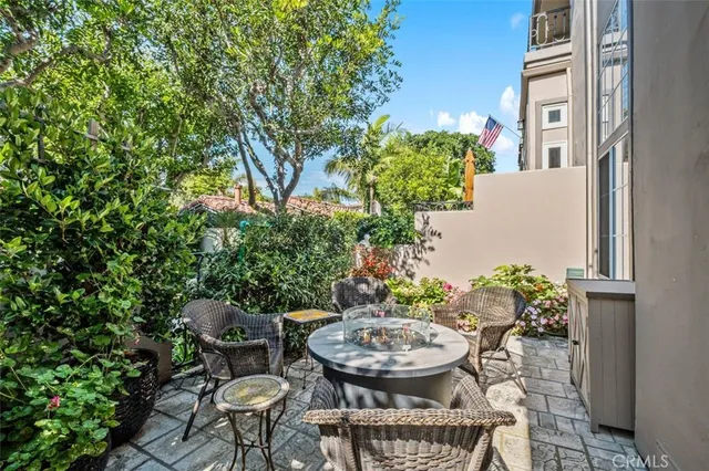 a view of a chairs and table in a patio