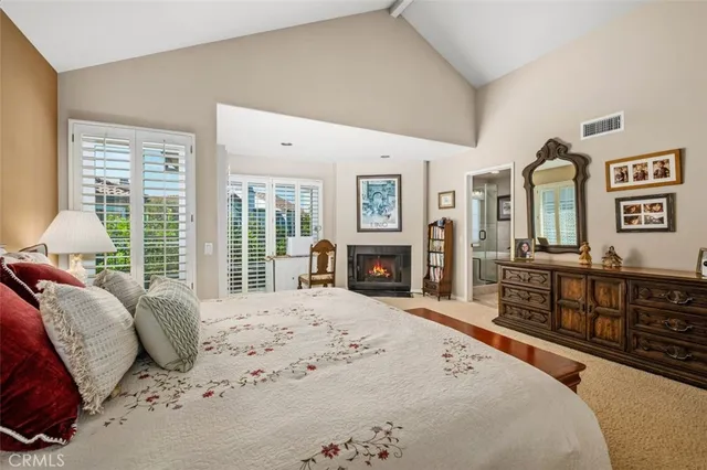 a view of a balcony with wooden floor and outdoor seating