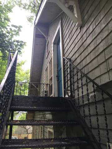 a view of building with yard