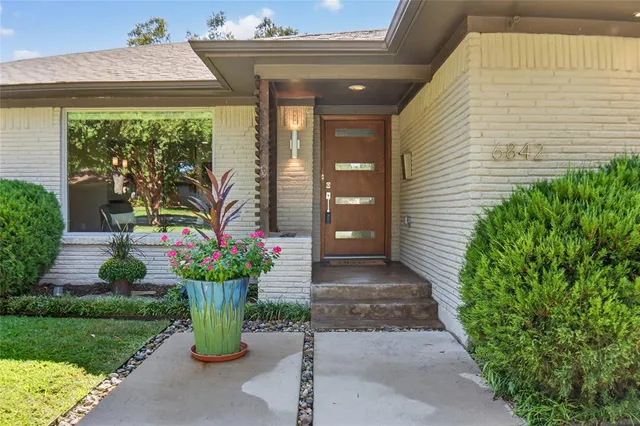 a house with a garden view