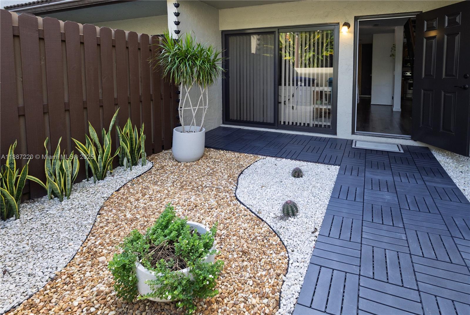 15365 Southwest 104th Terrace, Unit 2 Miami, FL 33196 - Photo 1 of 34 a view of a entryway door of the house