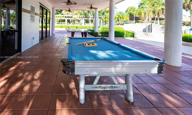 a view of a chairs and table on the wooden floor