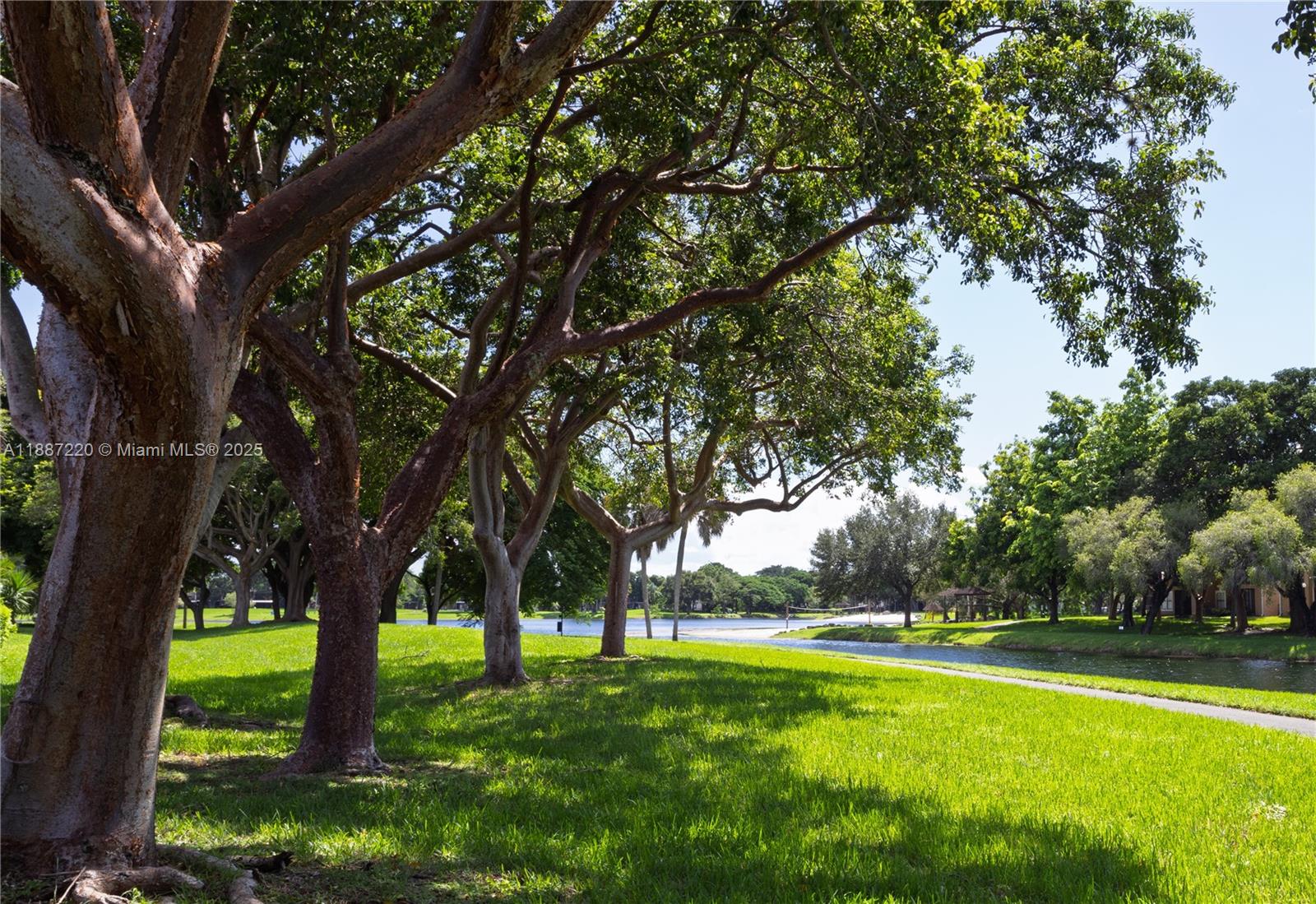 15365 Southwest 104th Terrace, Unit 2 Miami, FL 33196 - Photo 26 of 34 a view of a trees with a yard