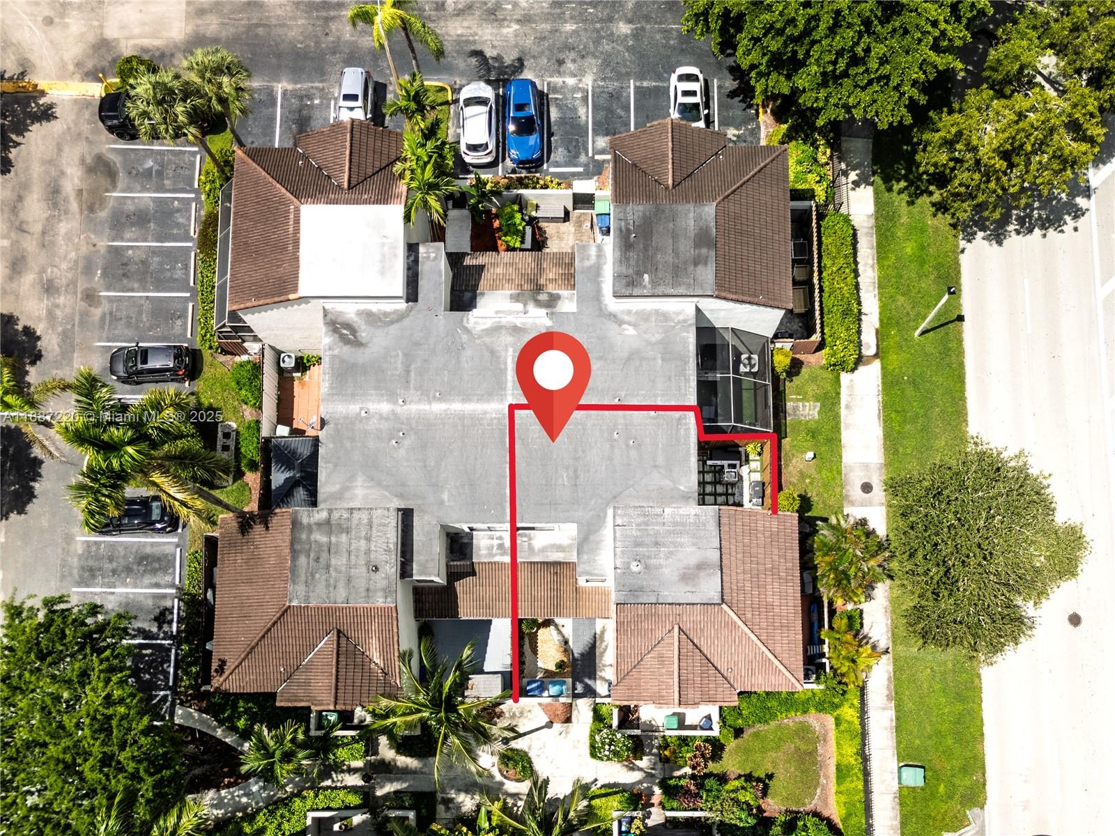 15365 Southwest 104th Terrace, Unit 2 Miami, FL 33196 - Photo 31 of 34 an aerial view of residential houses with outdoor space and parking