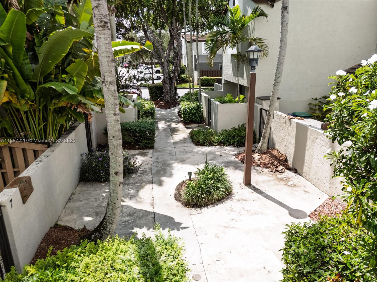 15365 Southwest 104th Terrace, Unit 2 Miami, FL 33196 - Photo 4 of 34 a view of yard from outdoor space