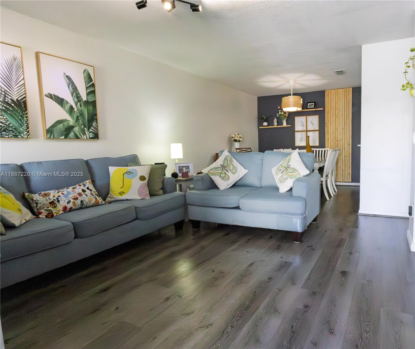 15365 Southwest 104th Terrace, Unit 2 Miami, FL 33196 - Photo 7 of 34 a living room with furniture and wooden floor