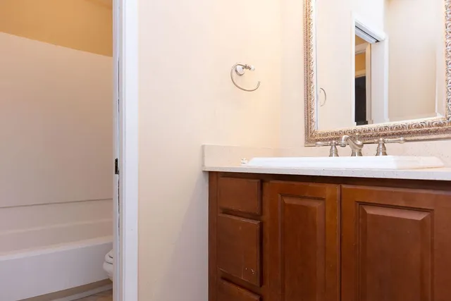 a bathroom with a sink and a bathtub
