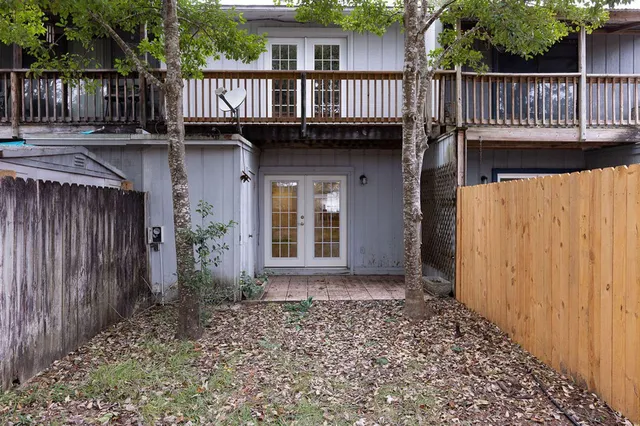 a kitchen with stainless steel appliances granite countertop a sink and a stove