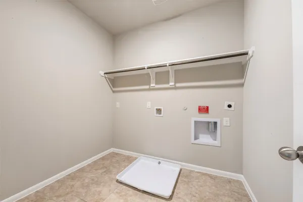 a bathroom with a shower sink and mirror