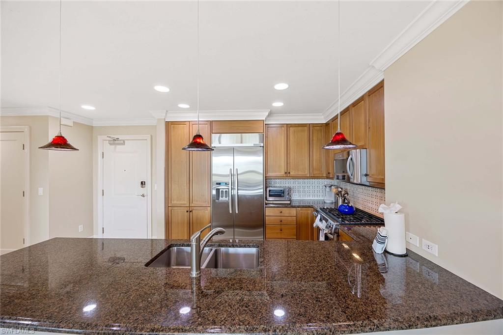 9115 Strada Place, Unit 5213 Naples, FL 34108 - Photo 13 of 32 a very nice looking room with a large window