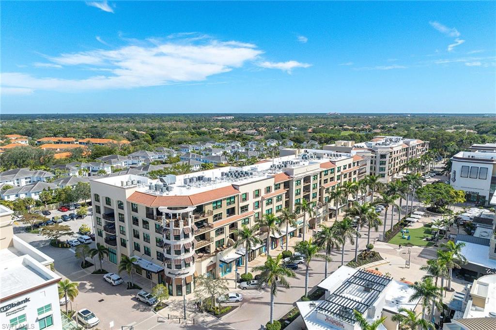 9115 Strada Place, Unit 5213 Naples, FL 34108 - Photo 2 of 32 a city view with tall buildings