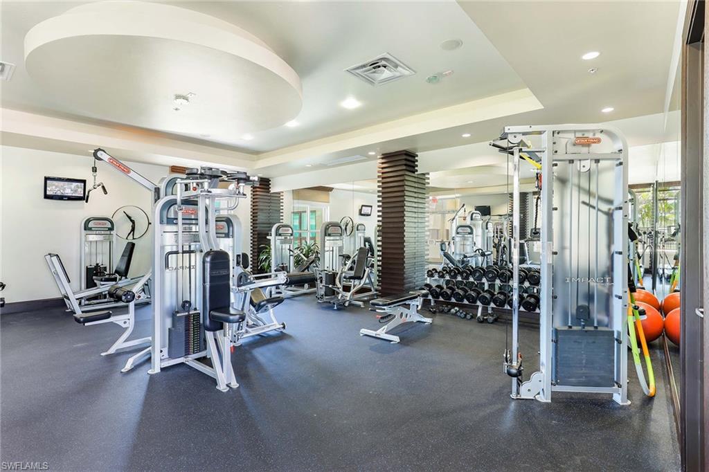 9115 Strada Place, Unit 5213 Naples, FL 34108 - Photo 27 of 32 a view of a room with gym equipment