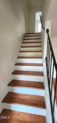 a view of a brick house with a large windows