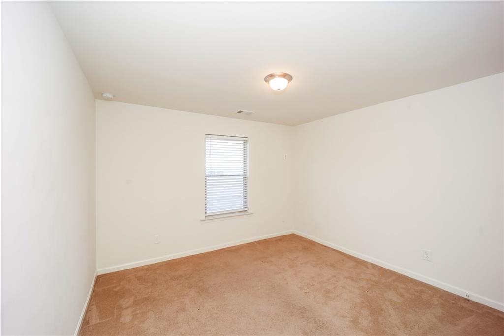 7638 Bucknell Terrace Fairburn, GA 30213 - Photo 11 of 17 an empty room with a window
