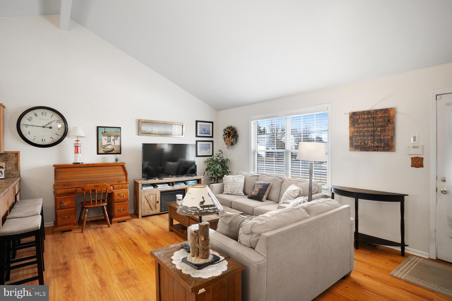 1321 Radio Road Little Egg Harbor, NJ 08087 - Photo 11 of 32 a living room with furniture a wooden floor and a flat screen tv