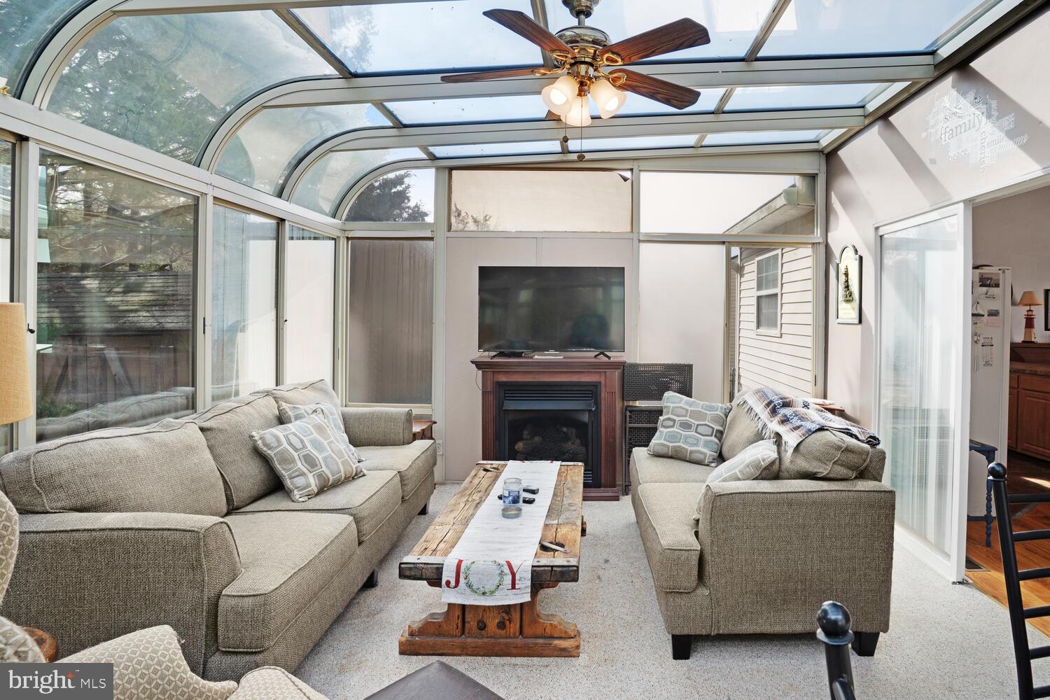 1321 Radio Road Little Egg Harbor, NJ 08087 - Photo 21 of 32 a living room with furniture and a flat screen tv