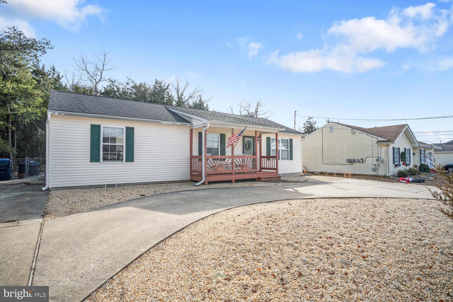 1321 Radio Road Little Egg Harbor, NJ 08087 - Photo 30 of 32 a view of a house with a backyard and a tree