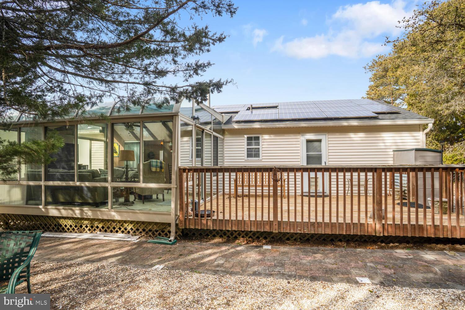 1321 Radio Road Little Egg Harbor, NJ 08087 - Photo 4 of 32 a view of a house with a small yard and large trees