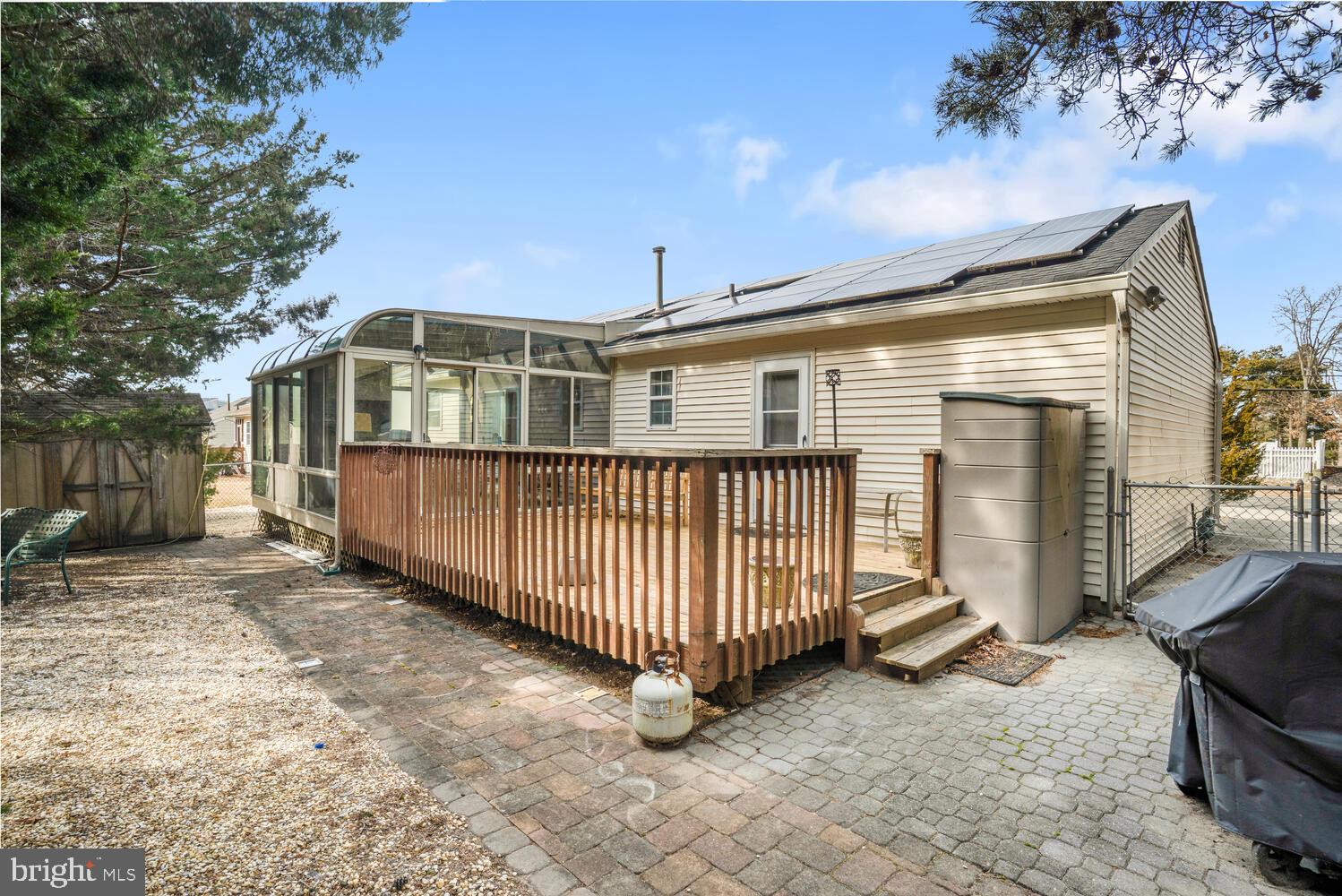 1321 Radio Road Little Egg Harbor, NJ 08087 - Photo 5 of 32 a view of a house with wooden fence
