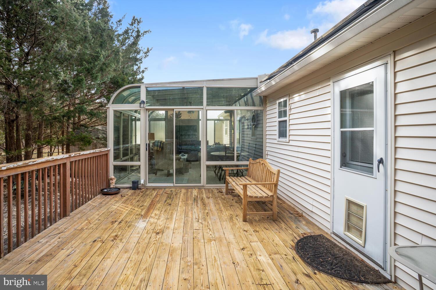 1321 Radio Road Little Egg Harbor, NJ 08087 - Photo 6 of 32 a view of a patio with a table and chairs