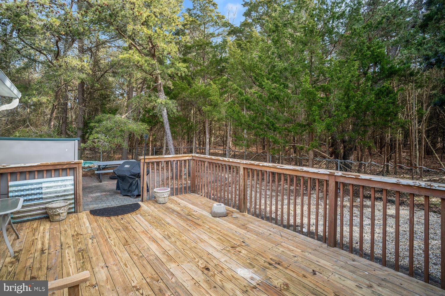 1321 Radio Road Little Egg Harbor, NJ 08087 - Photo 7 of 32 a balcony with wooden floor and fence