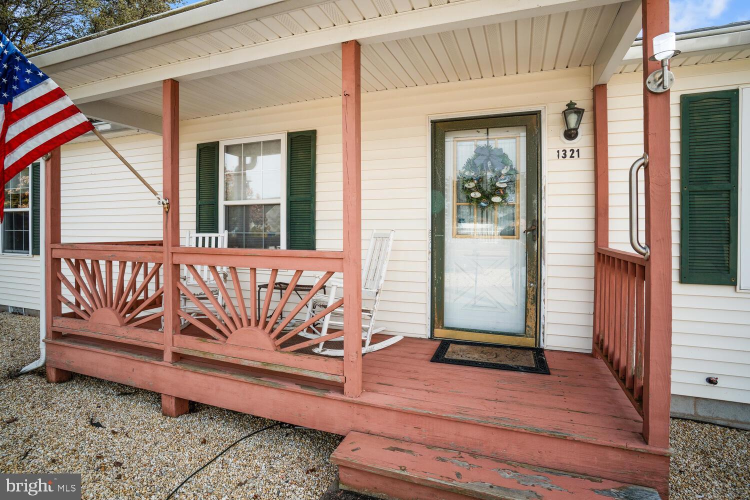 1321 Radio Road Little Egg Harbor, NJ 08087 - Photo 8 of 32 a view of a wooden bench with a window