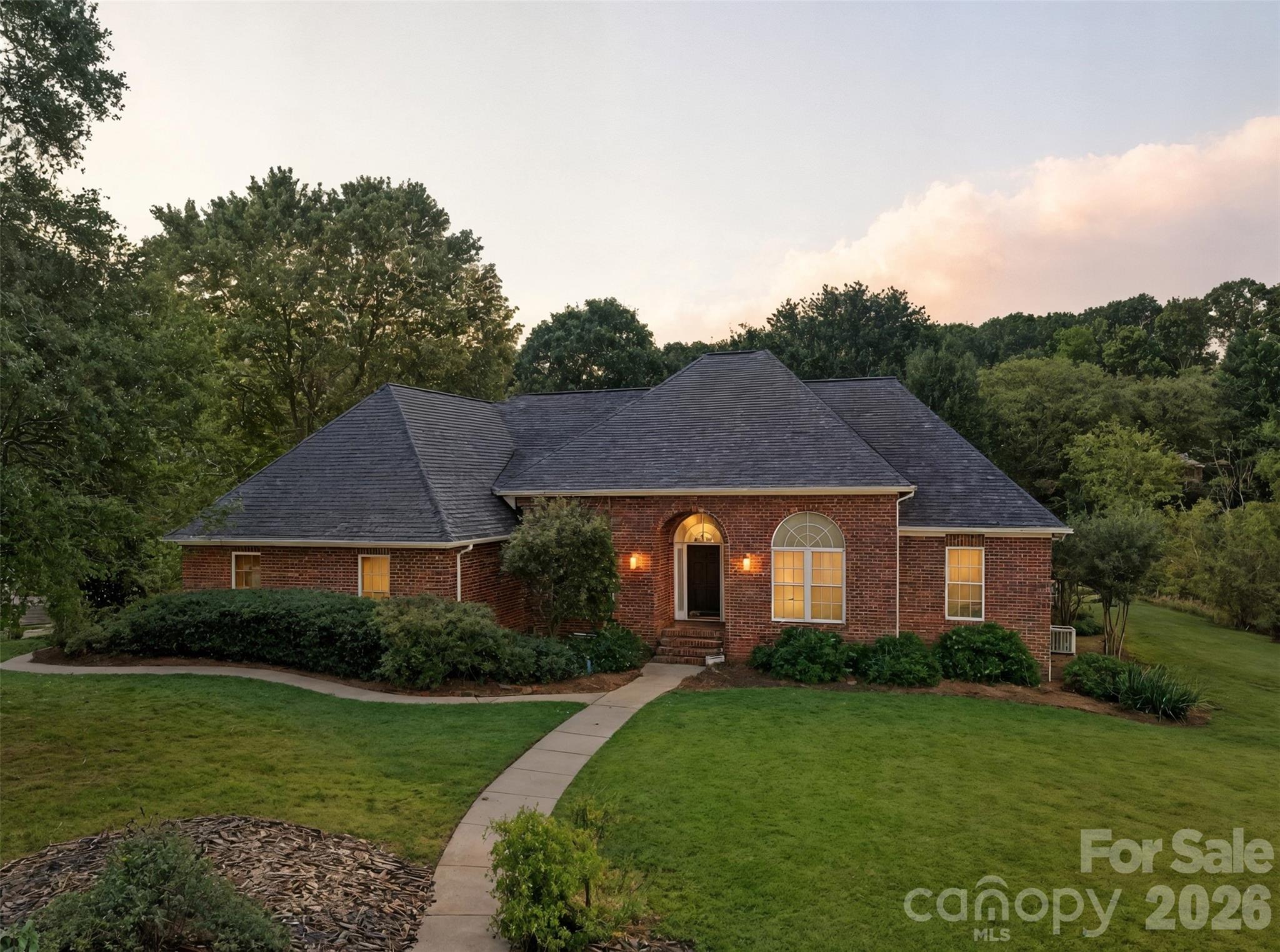 1337 Braeburn Road Northwest Concord, NC 28027 - Photo 35 of 36 a front view of a house with a yard