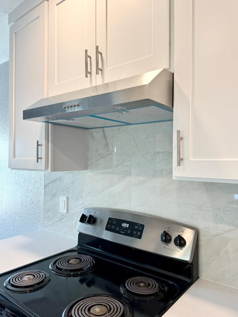 8 Lancaster Circle, Unit 224 Bay Point, CA 94565 - Photo 14 of 33 a stove top oven sitting inside of a kitchen