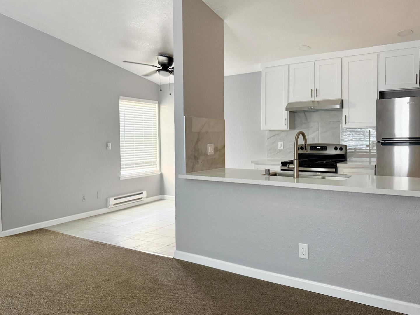 8 Lancaster Circle, Unit 224 Bay Point, CA 94565 - Photo 9 of 33 a kitchen with a sink stainless steel appliances and cabinets