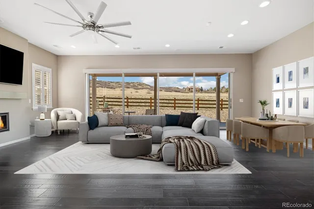 a bedroom with furniture and a large window