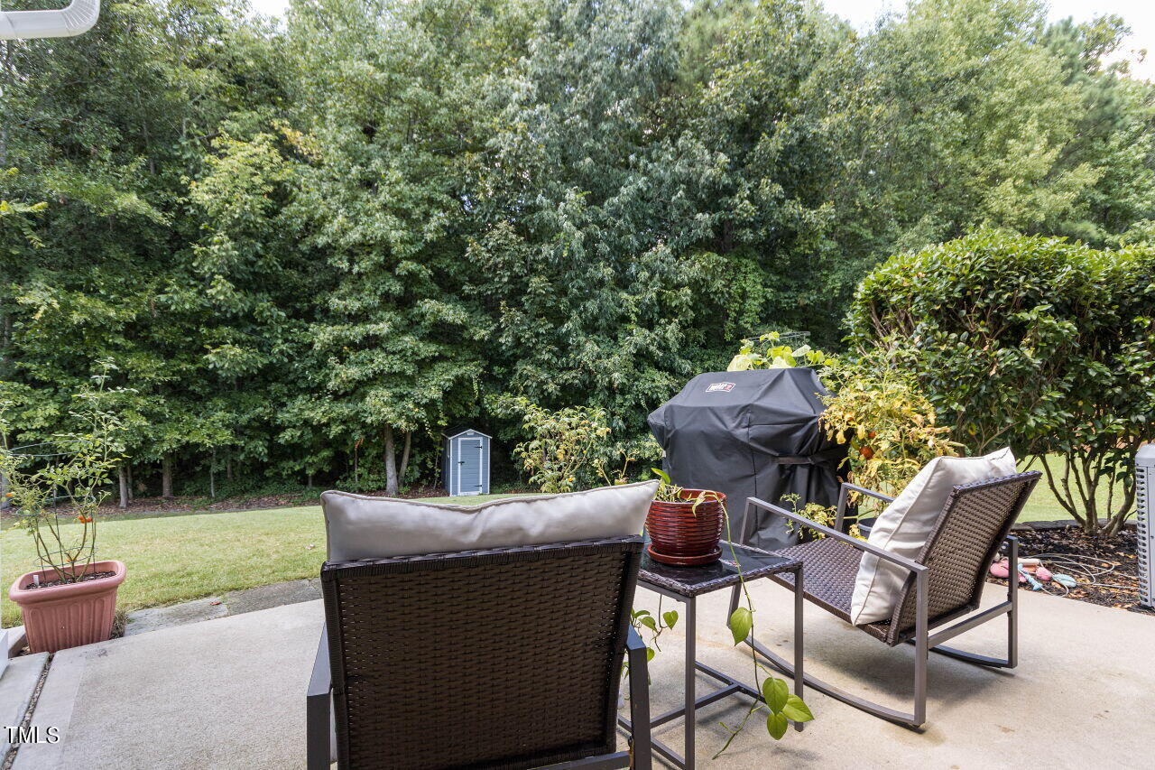 3464 Althorp Drive Raleigh, NC 27616 - Photo 26 of 32 Grill out on the patio and play a fun game in the yard.