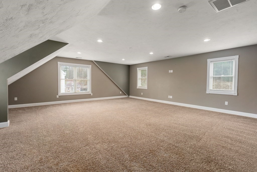 38 Draper Woods Road Sturbridge, MA 01518 - Photo 29 of 42 a view of an empty room with a window