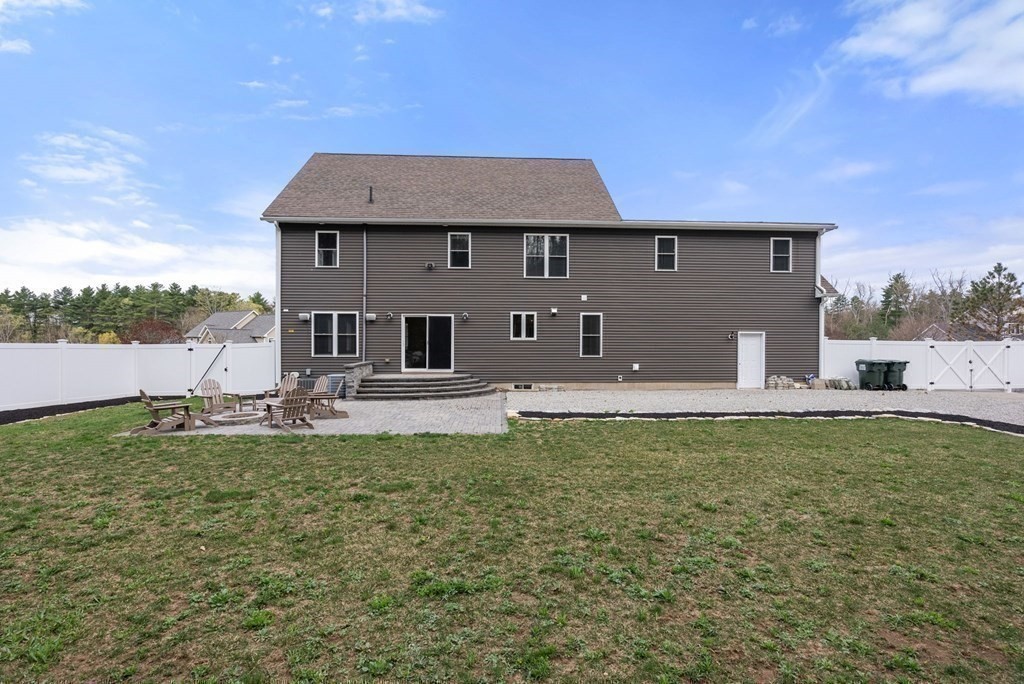 38 Draper Woods Road Sturbridge, MA 01518 - Photo 36 of 42 a house view with a outdoor space