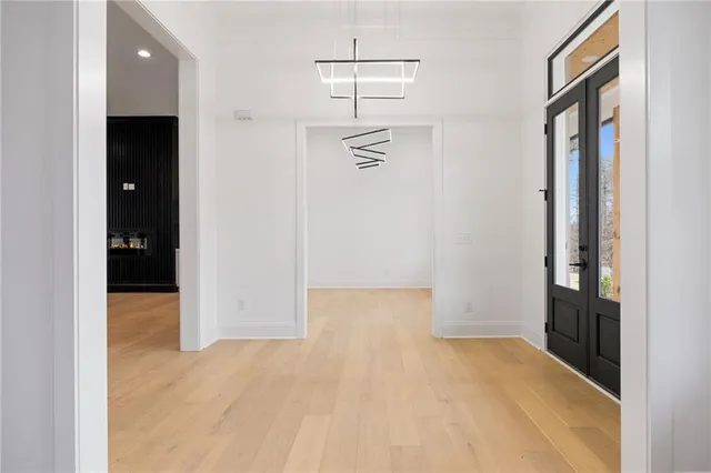 wooden floor in an empty room and a window
