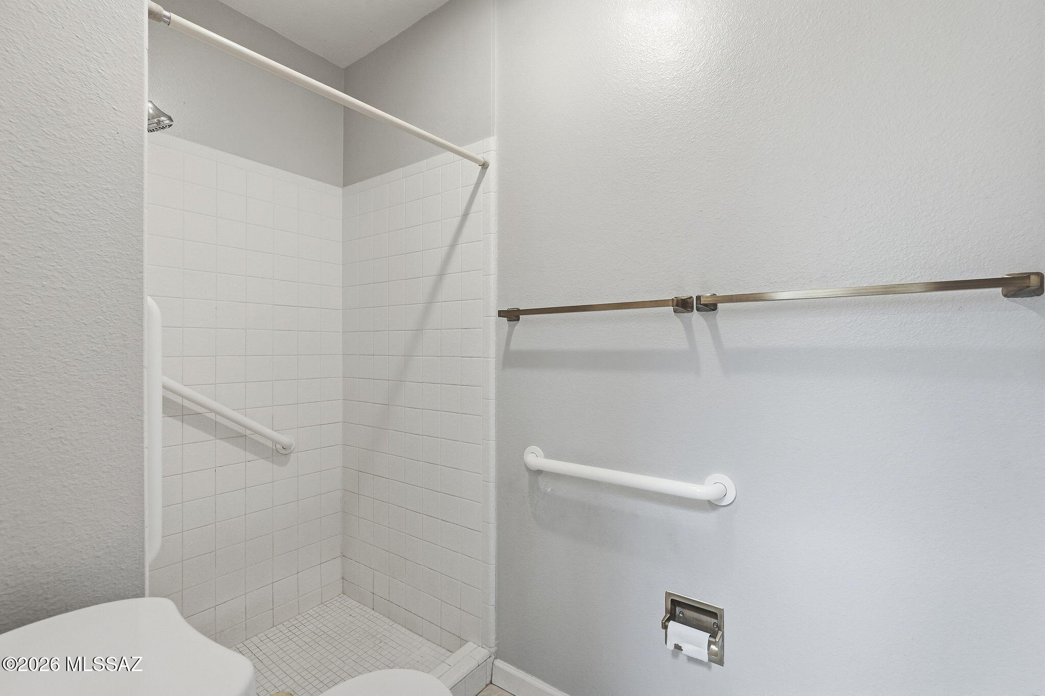 1949 North Swan Road, Unit 31 Tucson, AZ 85712 - Photo 22 of 33 Large walk-in shower with grab bars