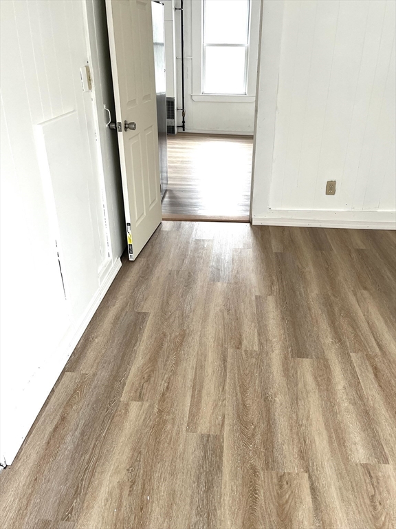 92 Emory Street, Unit 1 Attleboro, MA 02703 - Photo 5 of 8 a view of wooden floor in a room