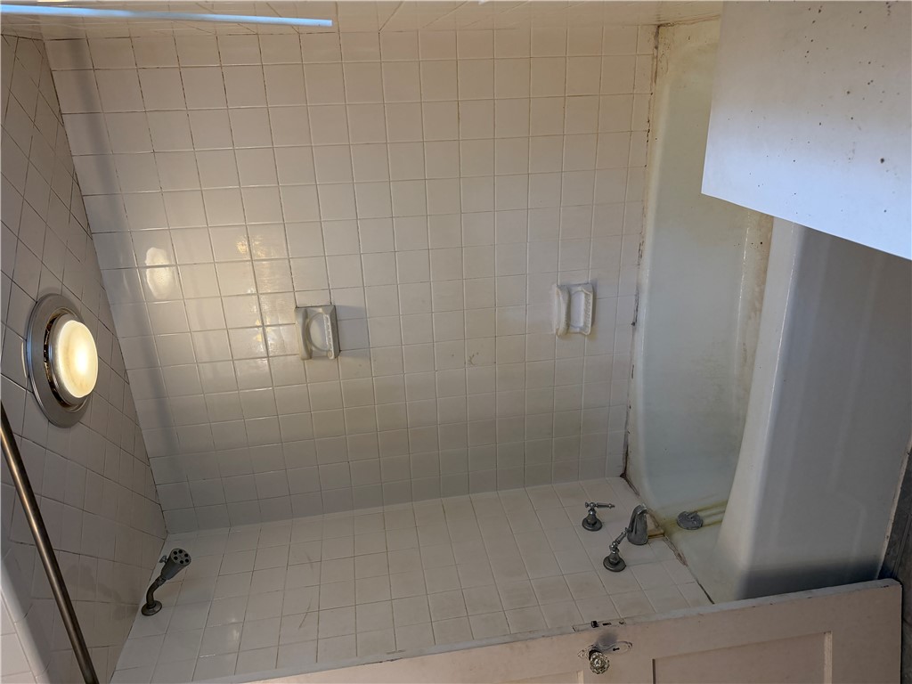 715 Concord Road Anderson, SC 29621 - Photo 22 of 24 In the 2nd bath step into a well-lit shower enclosure.
