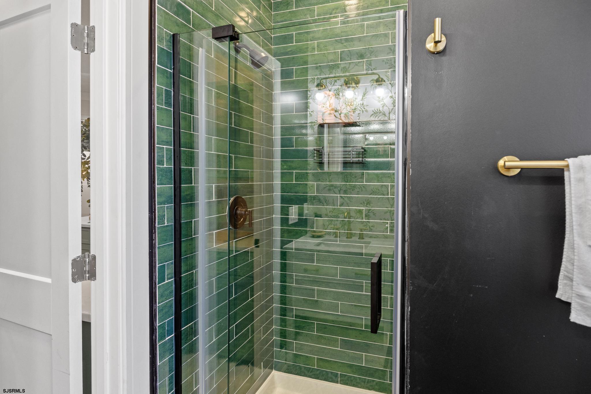 129 Seaside Avenue Atlantic City, NJ 08401 - Photo 11 of 43 a bathroom with a shower