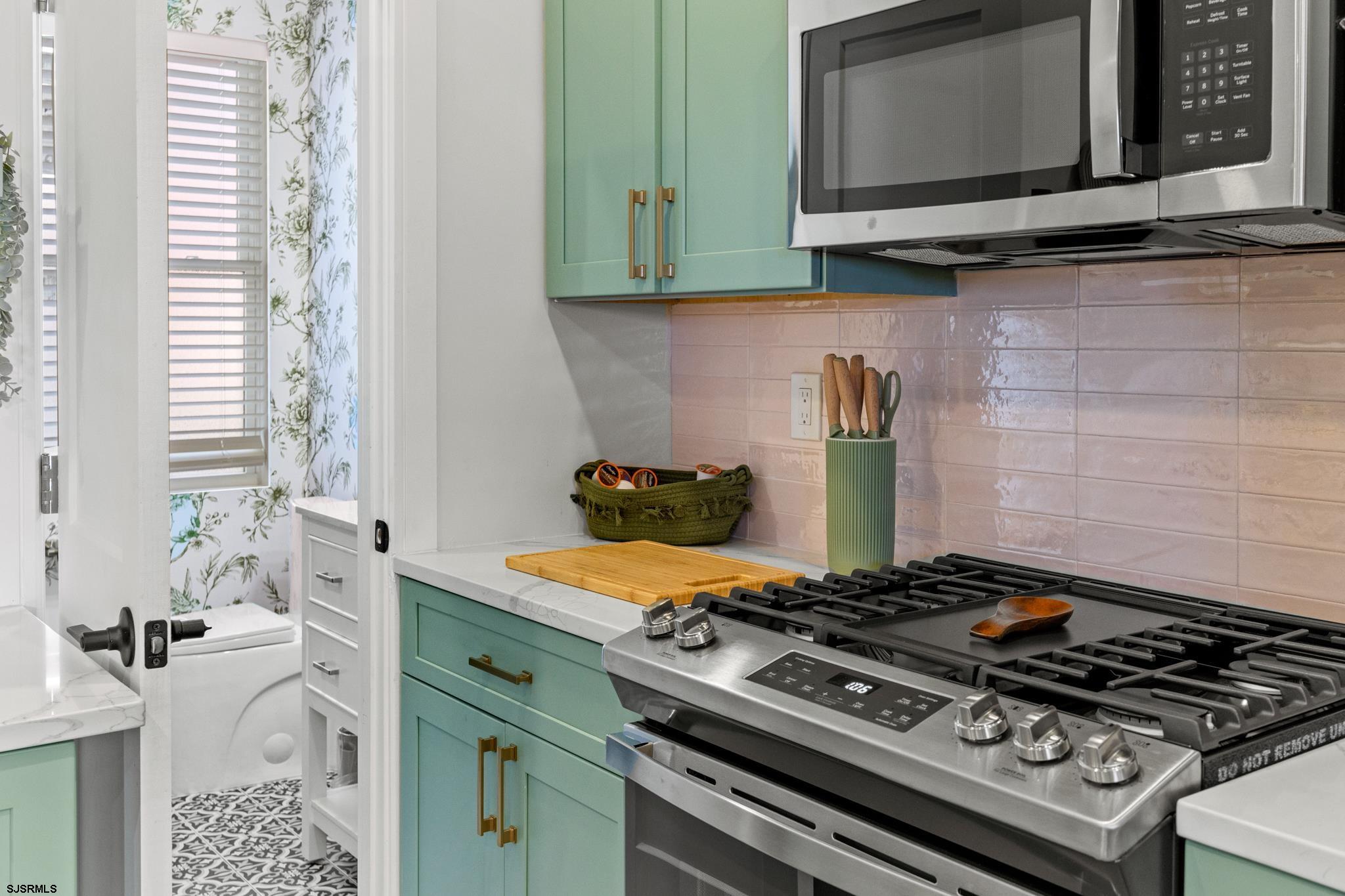 129 Seaside Avenue Atlantic City, NJ 08401 - Photo 8 of 43 a stove top oven sitting inside of a kitchen
