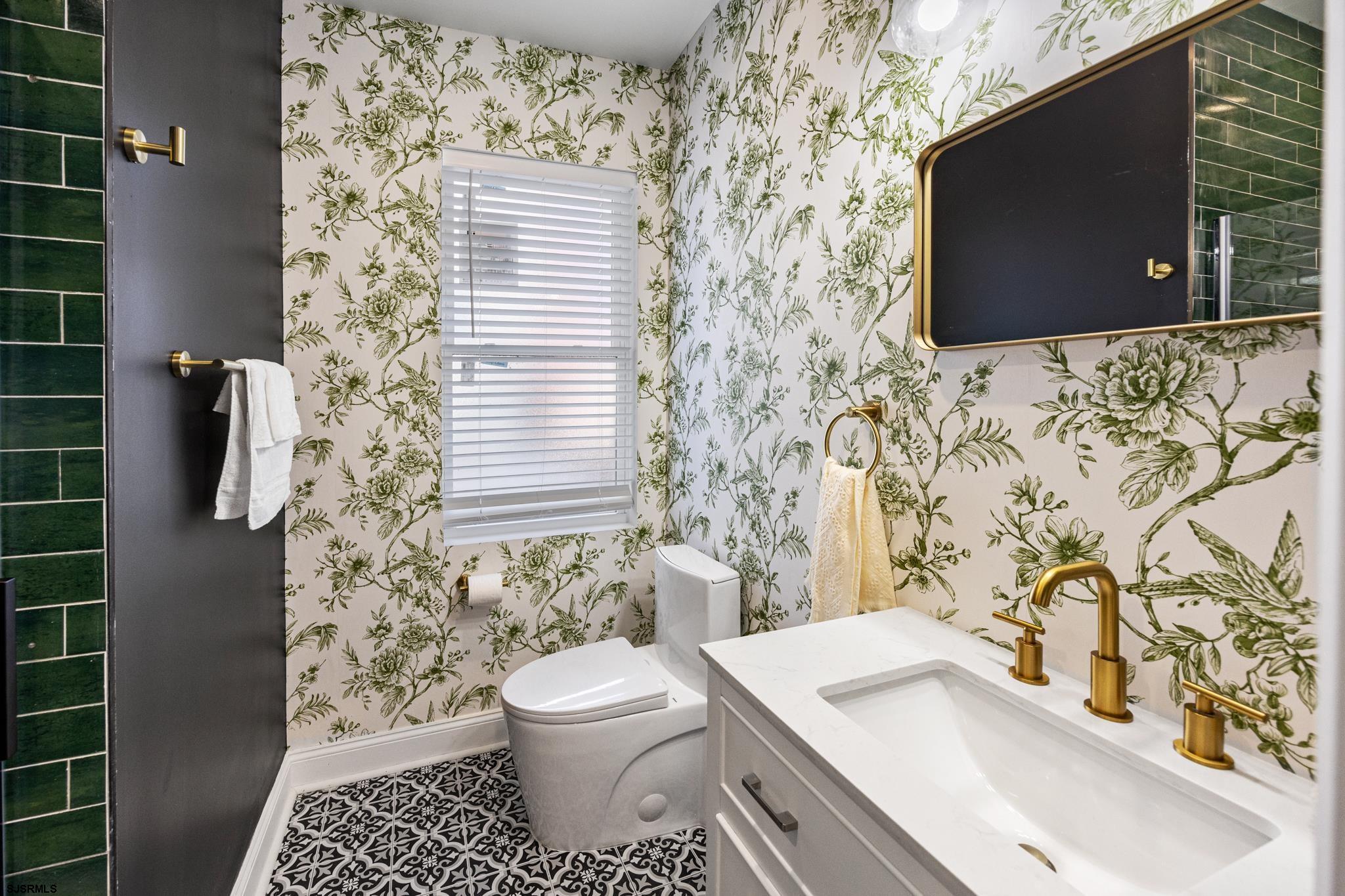 129 Seaside Avenue Atlantic City, NJ 08401 - Photo 10 of 43 a bathroom with a sink toilet and shower