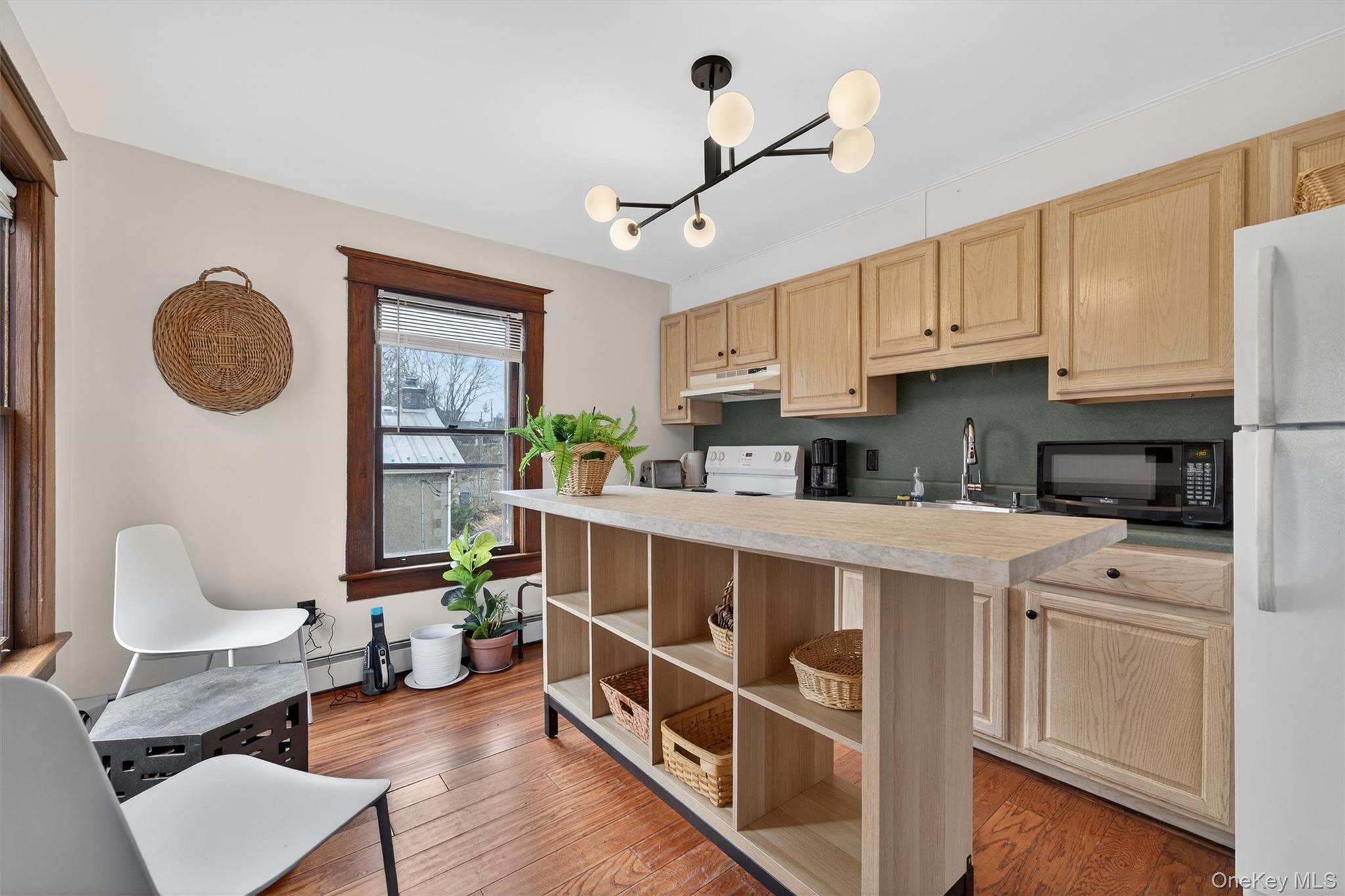 48 Kirks Road Narrowsburg, NY 12764 - Photo 19 of 50 a open kitchen with stainless steel appliances granite countertop a refrigerator a stove a sink dishwasher and white cabinets with wooden floor